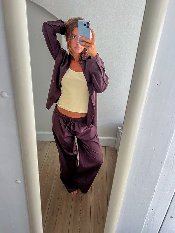Sofie is 165 cm tall and wears size S. | dark brown